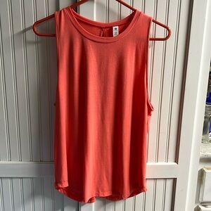 Glyder tank size medium worn a couple of times peachy/orange color